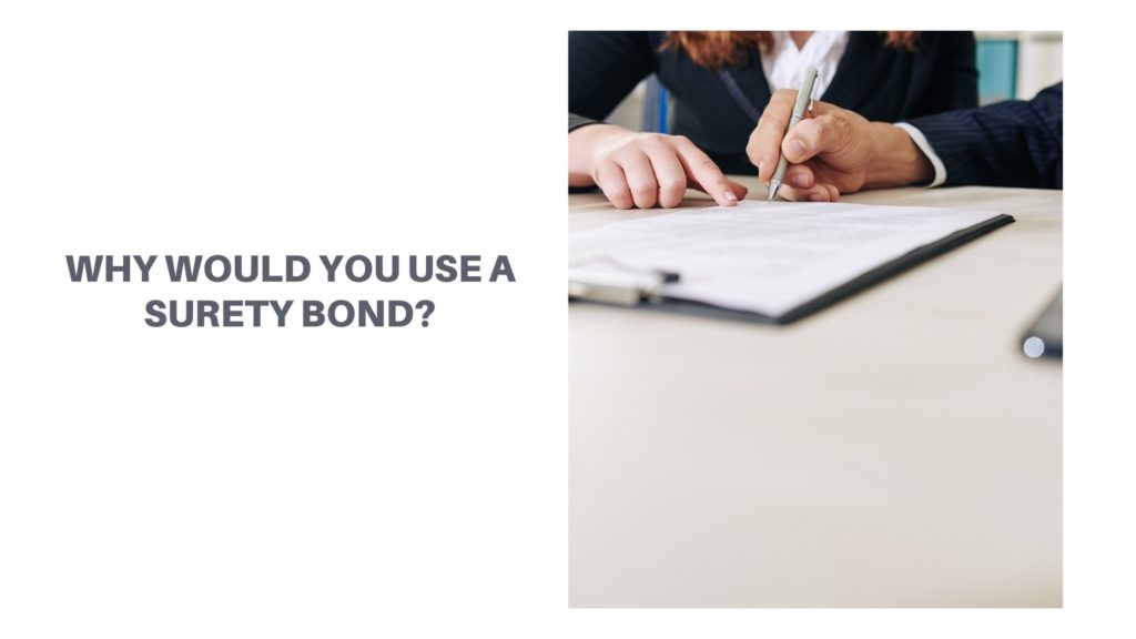 Why would you use a surety bond - A contractor or a businessma is signing a surety bond contract with the surety agent at the table.